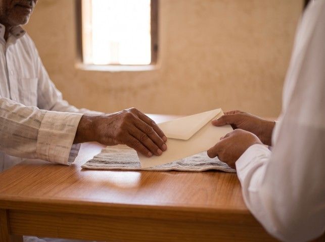 Paying loans for needy and distressed families